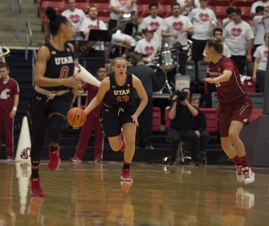 Utah sophomore guard Megan Jacobs dribbles the ball past a WSU player on Jan. 7 at Beasley Coliseum. Cougars have now lost three in a row after loss to University of California, Berkeley, on Sunday.