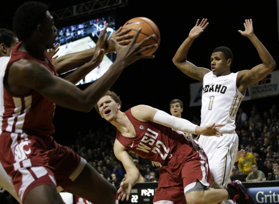 Sophomore guard Malachi Flynn plays defense as junior forward Robert Franks goes to steal the ball while playing against Idaho Wednesday, Dec. 6.