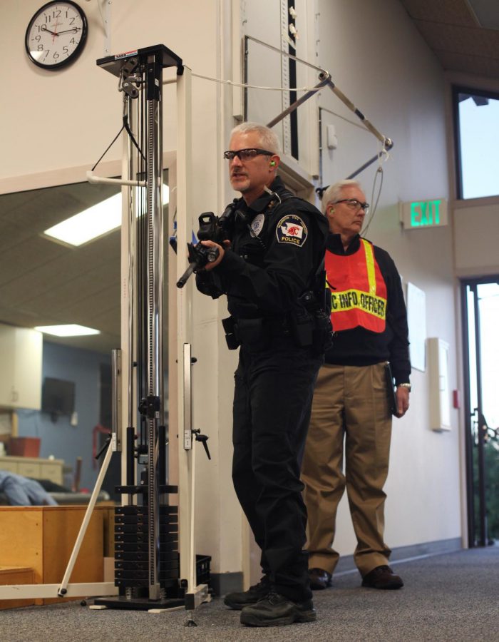 Pullman Police officers clear a room during an active shooter drill Oct. 6, 2013.