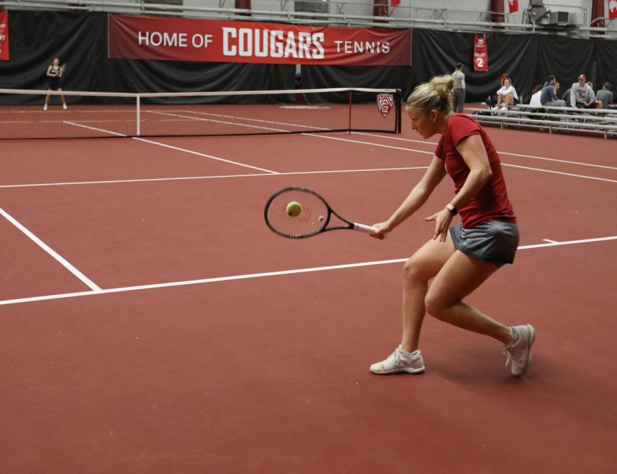 WSU junior Aneta Miksovska returns a shot in a match against Montana State 
on Jan. 20 at Hollingbery Fieldhouse. She won her singles match 6-1, 6-0.