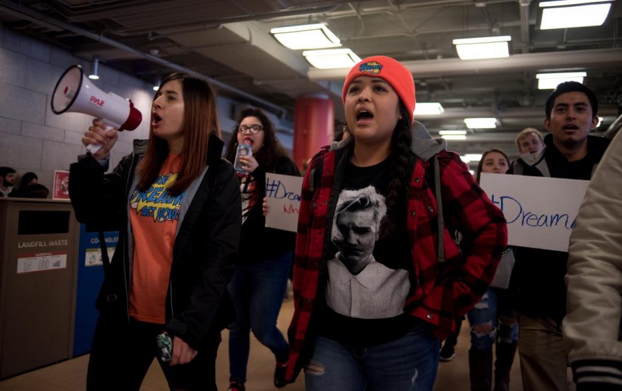 ASWSU Sen. Itzel Trejo, right, helps lead a march through the CUB on Thursday in support of the DREAM Act.