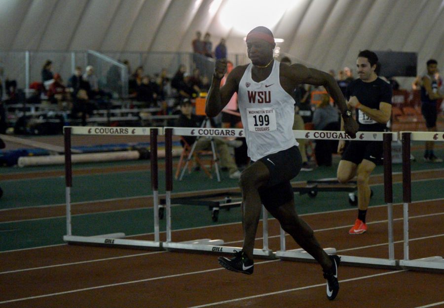 Abu+Kamara+competes+in+the+60+meter+hurdles+during+the+Cougar+Indoor+on+Feb.+3.