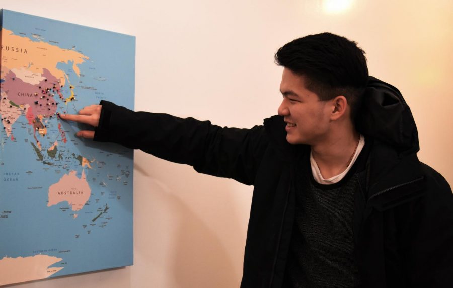 Sheng-Chieh Jay Kuo shows where Taiwan, his home, is in comparison to other students in the INTO program. This is his first year in the United States.