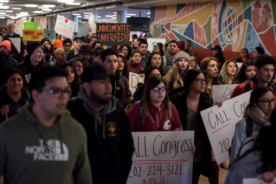 DACA march attendees filled the CUBs main hallway while chanting for Dream Act support with megaphones Thursday.