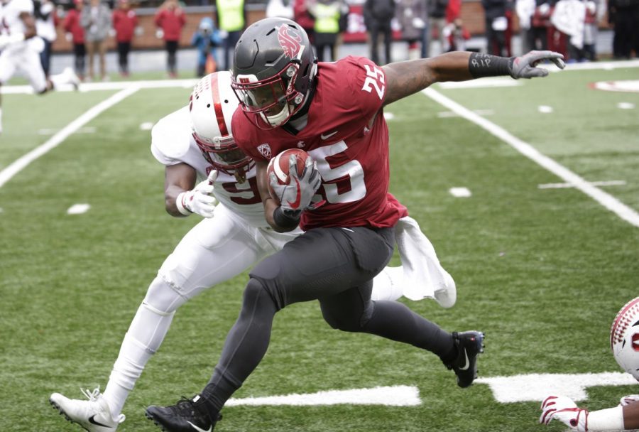 Jamal Morrow runs the ball against Stanford on Nov. 4, 2017 at Martin Stadium. He is one of the departing seniors WSU will look to replace in the upcoming season.