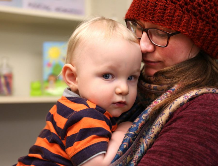 Maren Mossman, a Pullman resident and WSU graduate student, holds her son, Liam, who attends the Childrens Center. GPSA will decide whether to increase funding to the child care service.