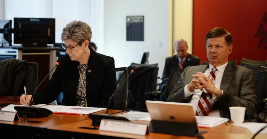 Chair of the Board of Regents Theodor Baseler, right, and board member Lura Powell listen at a September Board of Regents meeting. WSU President Kirk Schulz can carry out certain financial policies without the board’s approval.