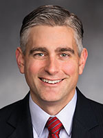 Michael Baumgartner graduated from WSU in 1999. Has served as Spokane Treasurer, state senator.