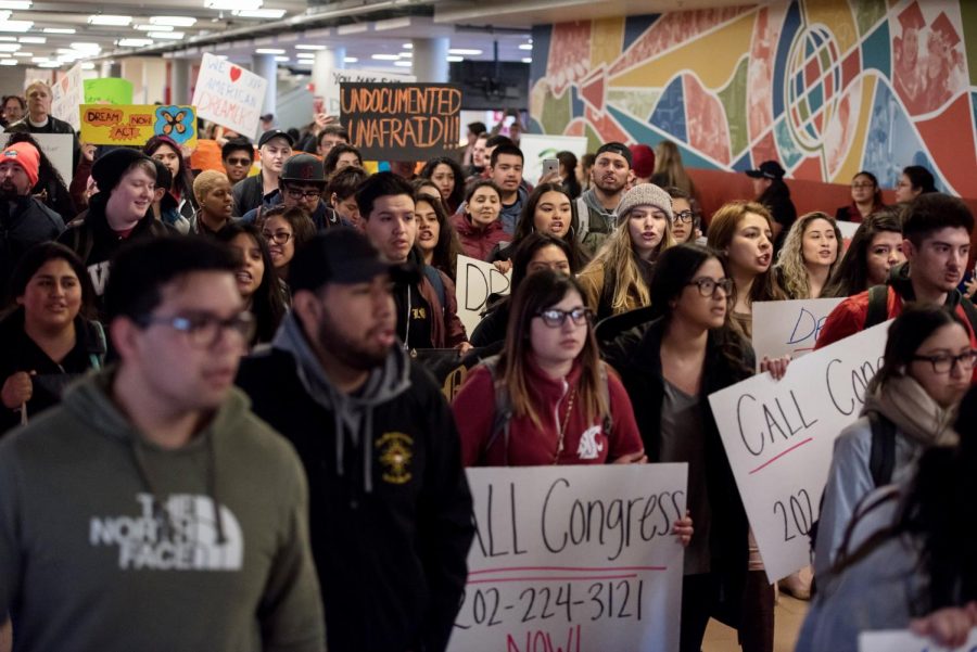 DACA march attendees filled the CUBs main hallway while chanting for DREAM Act support with megaphones Thursday. 