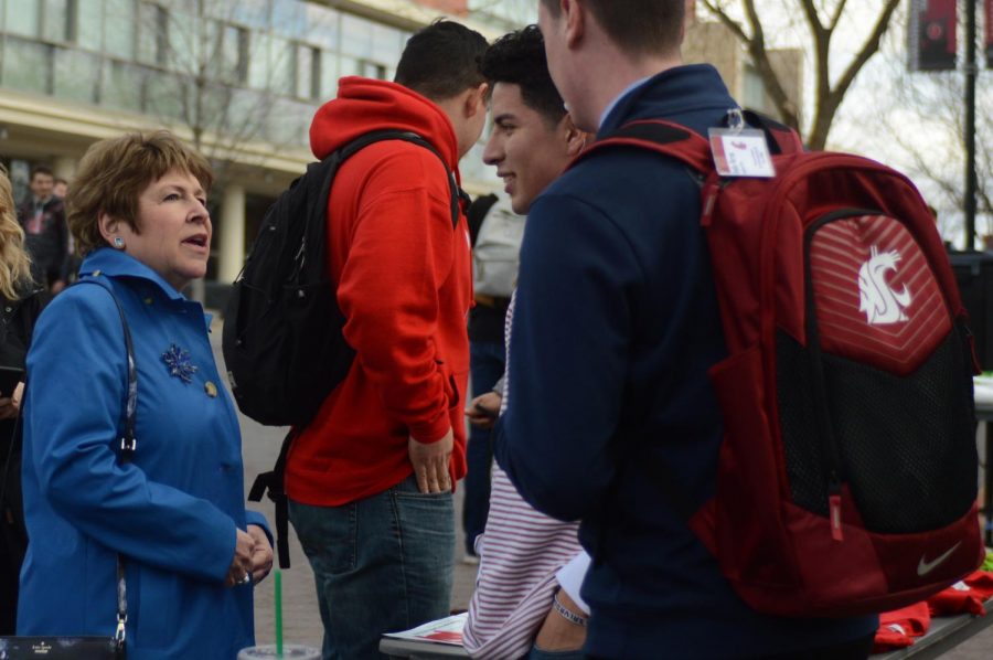 Lisa Brown, a Democratic congressional candidate and former WSU Spokane chancellor, introduces herself to students Thursday on the Glenn Terrell Friendship Mall.