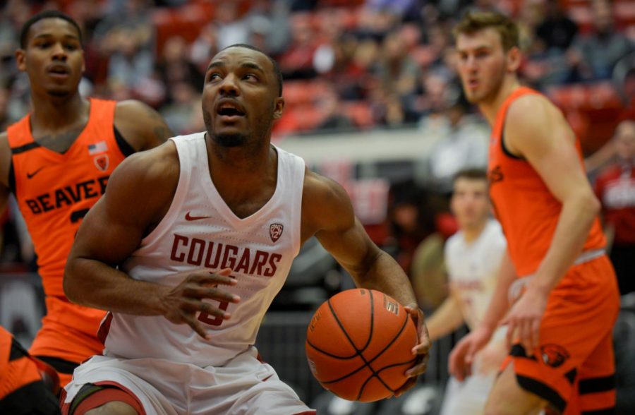 Milan Acquaah attempts to slip past an OSU guard Wednesday in a game at Beasley Coliseum.