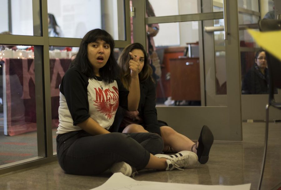 Co-chair+of+QPOCA+Alejandrx+Martinez+protests+WSU+oppressing+marginalized+students.+The+demonstrators+claim+they+were+locked+out+of+a+Q%26A%2C+where+they+planned+on+demanding+an+official+statement+from+the+university.