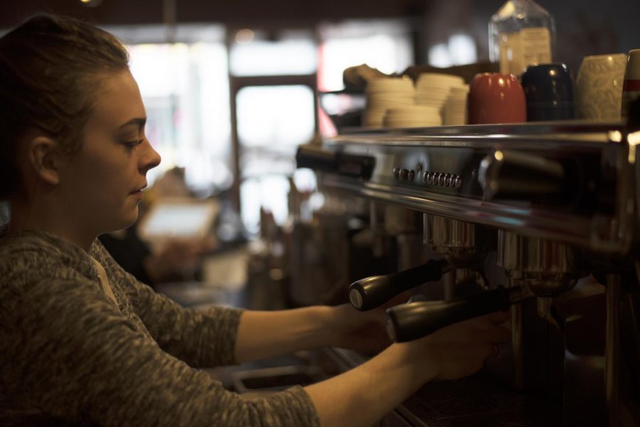 Barista Briana Ishrig pulls a shots for a customer Thursday morning at the Daily Grind.