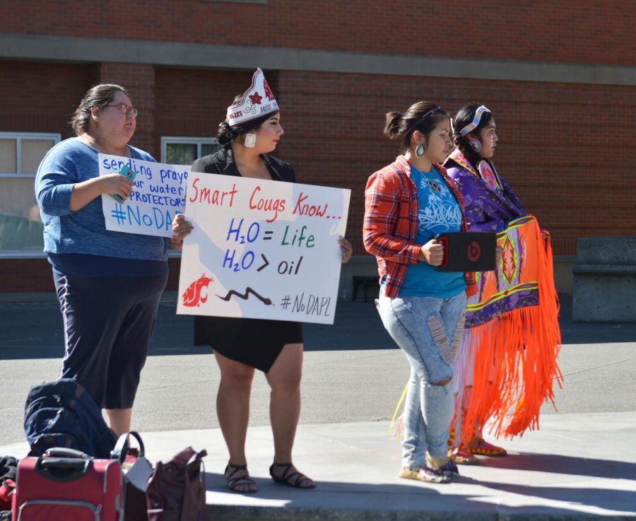 NAWA member MyKel Johnson, second from left, protest the Dakota Access Pipeline on Sept. 13, 2017 in front of Todd Hall.