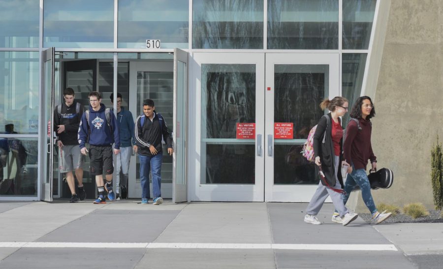 Students exit Pullman High School on Tuesday. Following last Wednesday’s walkouts protesting gun violence, a student said he was threatened with detention for participating.