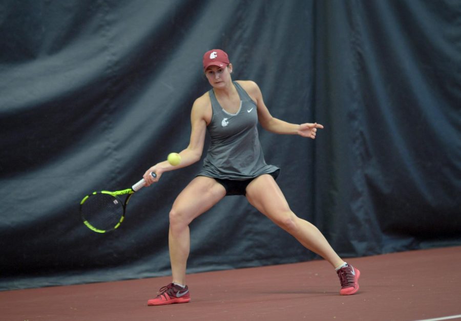 Senior Barbora Michalkova focuses in as she pulls back her racket to return the ball during a match against Eastern Washington on Feb. 24 at Hollingbery Fieldhouse.