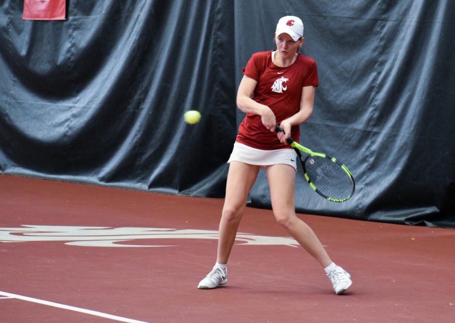 Freshman+Michaela+Bayerlova+winds+up+to+connect+with+the+ball+in+an+attempt+to+continue+the+rally+during+her+match+against+Stanford+on+Friday.+