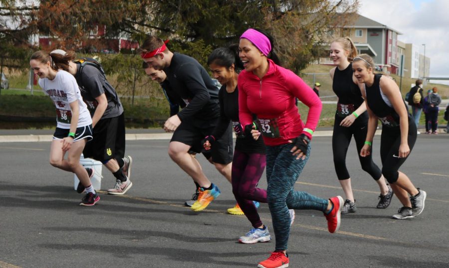 tudents participate in the Rugged 5k race last April. Alpha Sigma Phi will start in the tennis court parking lot.