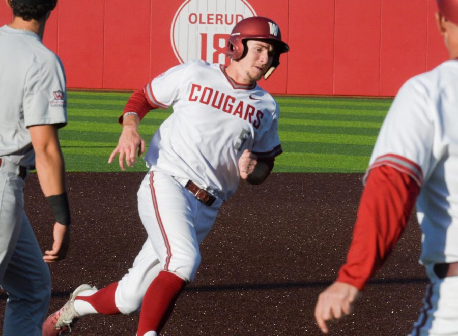 Junior infielder Justin Harrer rounds third base on his way to home against Santa Clara on April 20 at Bailey-Brayton Field.