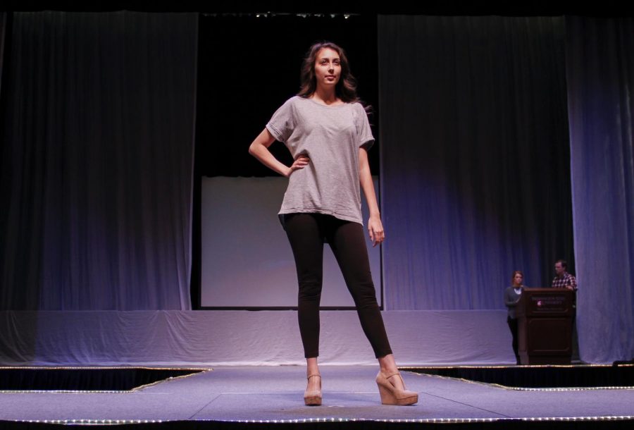 Ashlie Roswall, a model for the 2015 Mom’s Weekend Fashion Show, practices during a rehearsal.