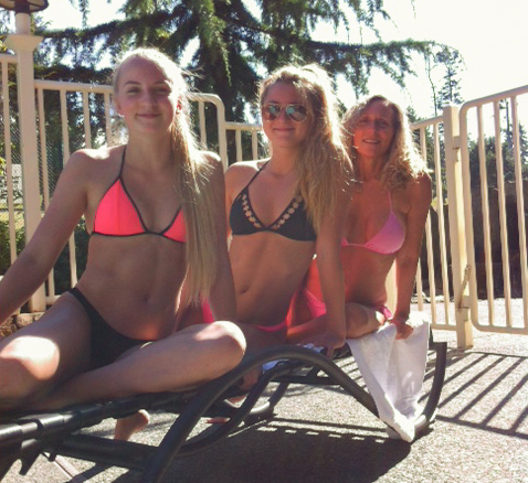 Debra Carr, right, hangs out with her daughter, Bailey, middle. They often spend time at lakesides or pools.