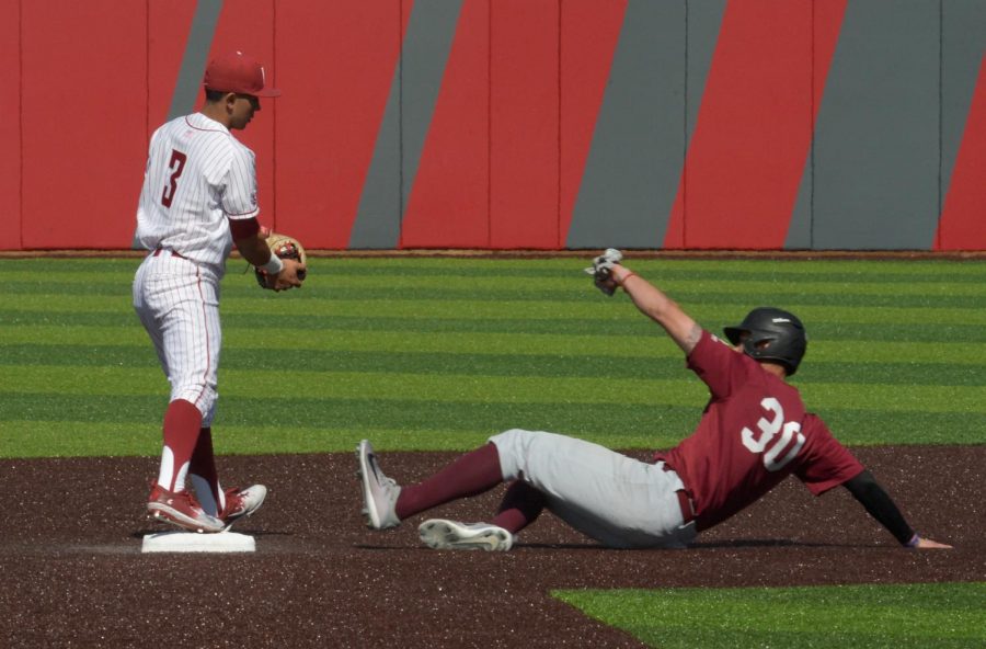 Junior infielder Andres Alvarez forces Santa Clara senior infielder Jake Brodt out as he slides into second during game two of the series against Santa Clara University on Sunday at Bailey-Brayton Field.