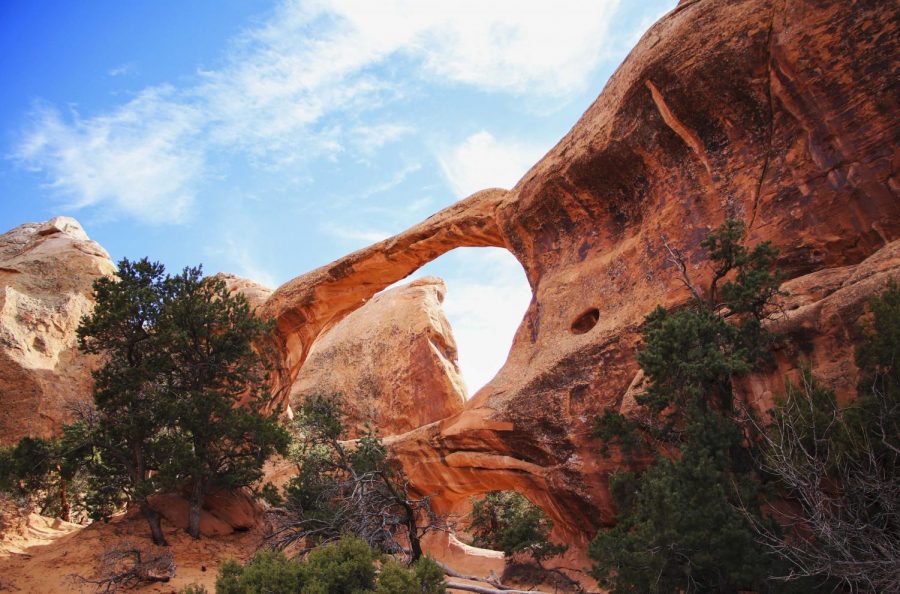 The Double O Arch can be found on the Devils Garden Trail in Arches National Park. The arch was formed as a result of millions of years of natural erosions and geographic alterations of an ancient salt bed deposited across the Colorado Plateau. Its a beautiful lesson in the perfection nature can work when left to its own devices, without anthropological influences.