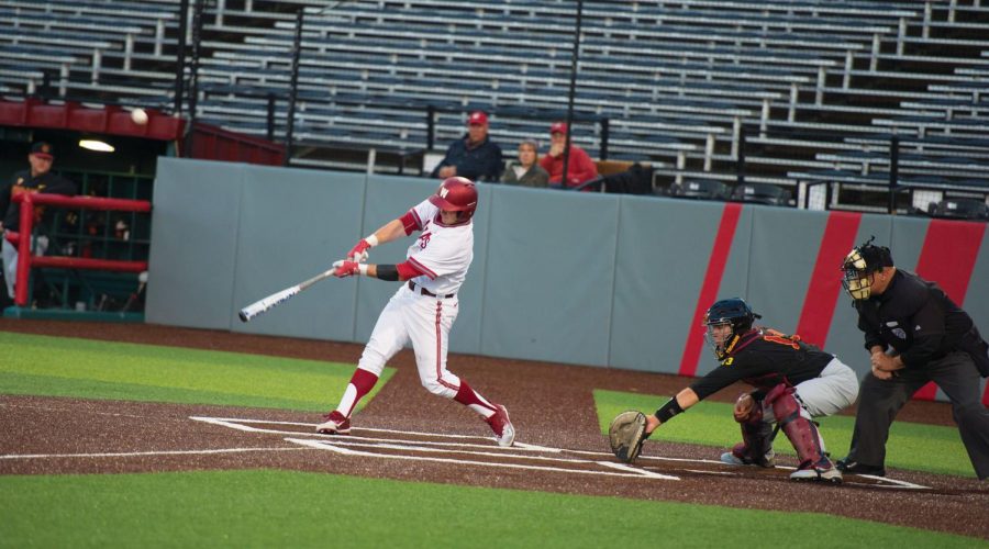 Senior outfielder JJ Hancock hits the ball in a game against USC on May 11 at Bailey-Brayton Field.