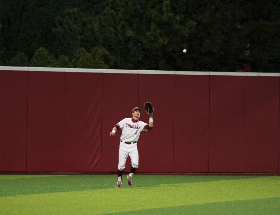 Junior outfielder Justin Harrer catches a fly ball in a game against USC on May 11 at Bailey-Brayton Field. 