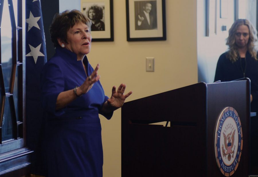 Lisa Brown, pictured here speaking at the Foley Institute on March 29, has apologized and edited an ad showing a WSU logo at the request of the university.