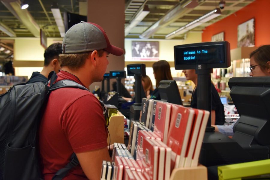 WSU students buy textbooks on Wednesday afternoon at The Bookie. Students should explore other options when cost is high.