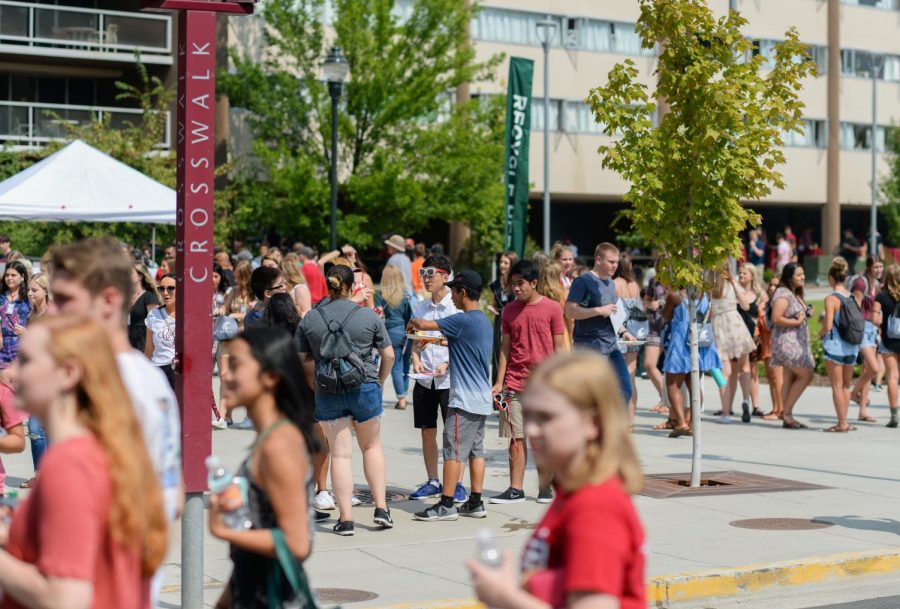 Students enjoy food and browsing various tables and stalls set up during Friday’s All Campus Picnic as part of Week of Welcome. This introductory week should also include more information about the various services on campus related to mental health.