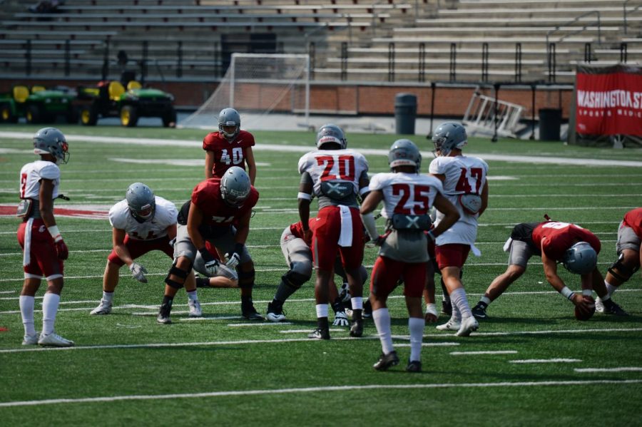 Sophomore linebacker Dominick Silvels, No. 20, lines up to rush the kicker attempting a field goal during a scrimmage Aug. 18 in Martin Stadium.
