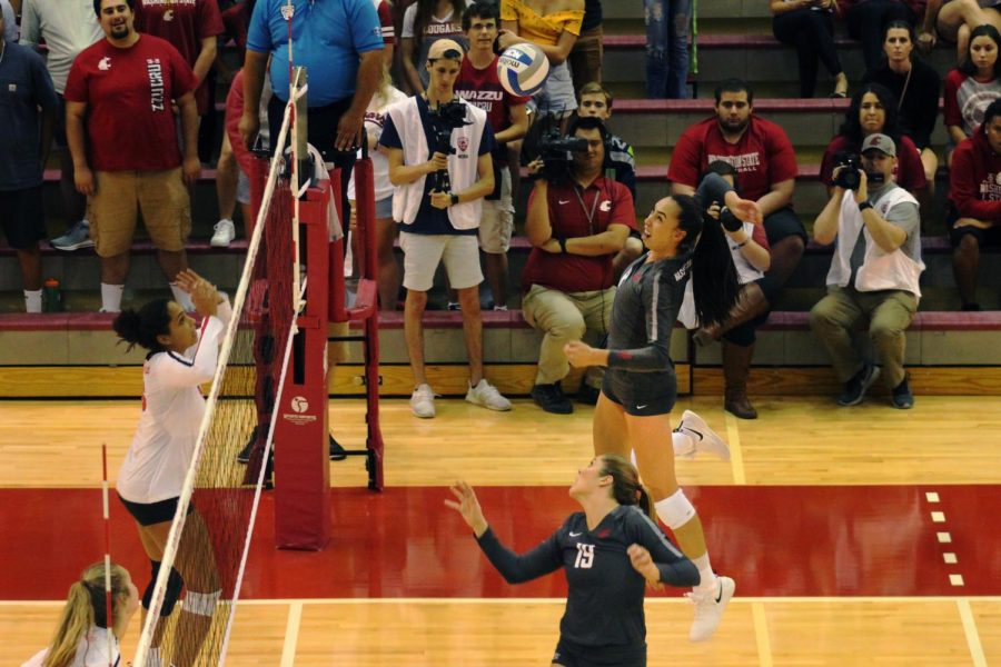 Redshirt junior middle blocker Jocelyn Urias spikes the ball against Illinois State
on Friday in Bohler Gym.