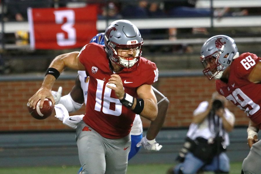 Graduate transfer quarterback Gardner Minshew II runs the ball while looking for an open pass during the game against San Jose State on Sept. 8 at Martin Stadium.