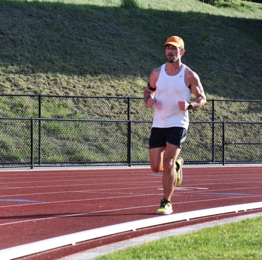 Nicholas Potter, the WSU student representative on the Palouse Road Runners board, participates in the groups weekly workout at the Dan OBrien Track and Field Complex on May 22.
