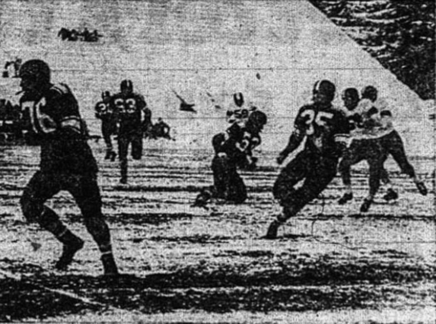 Bill Steiger follows team captain Jerry Brockey down the field against the San Jose Spartans on Nov. 15, 1955. 