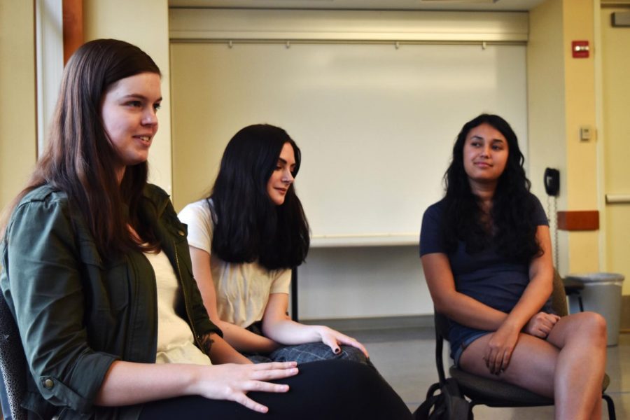Jordan Smith, left, Caitlin Boss, middle, and Sana Nawid, right, executive members of the Political Science Club, share their thoughts on what Lisa Brown, Democratic candidate for Washington’s 5th Congressional District, plans to implement if she was elected.