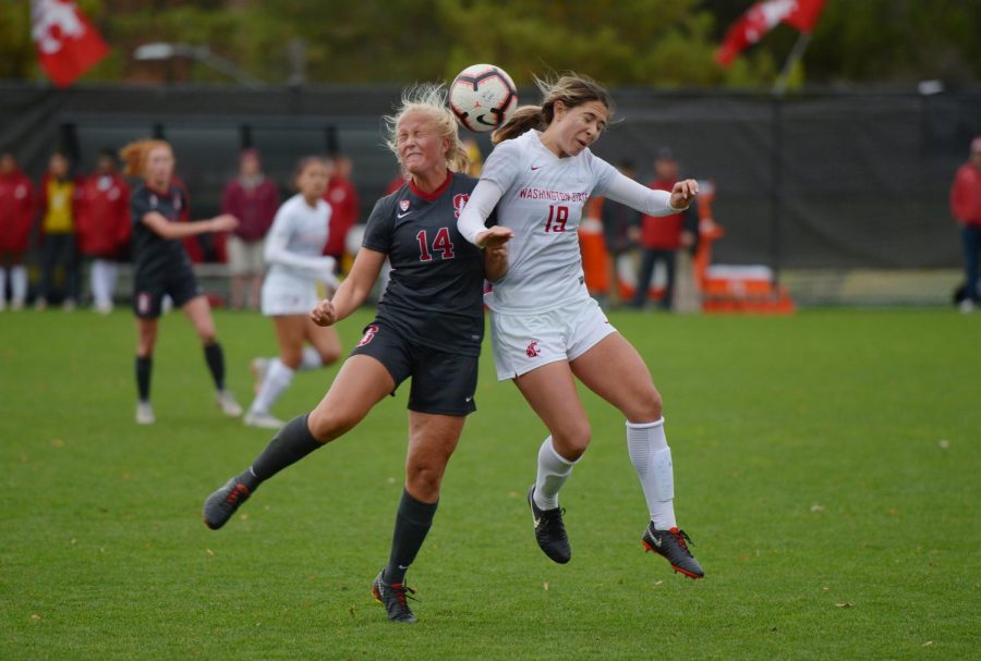WSU senior defender Maddy Haro collides with Stanford sophomore forward Civana Kuhlmann while going for a header during the game Sunday at the Lower Soccer Field.