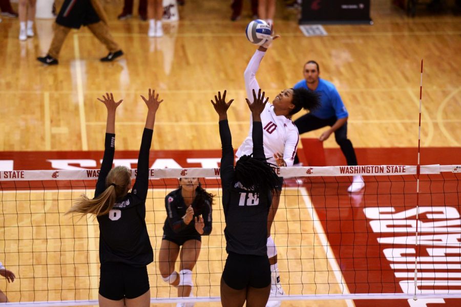 Senior outside hitter Taylor Mims strikes the ball in the game against University of Colorado on Sunday in Bohler Gym.