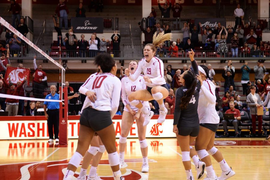 WSU celebrates after scoring the winning point in the match against University of Colorado on Sept. 30 in Bohler Gym.