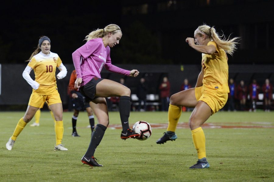 Looking+to+win+the+50-50+ball%2C+WSU+sophomore+midfielder+Sydney+Pulver+challenges+University+of+Southern+California+junior+midfielder+Jalen+Woodward+for+the+ball+in+the+matchup+Oct.+13+at+the+Lower+Soccer+Field.