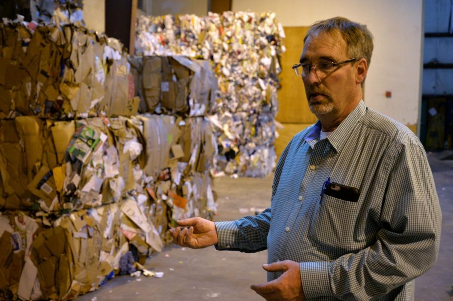 “We’re trying to ... make an emphasis on reducing contamination and [increasing] clean recycling,” Rick Finch, WSU waste management manager, said as he shows compacted cardboard bales in the WSU Surplus Stores.