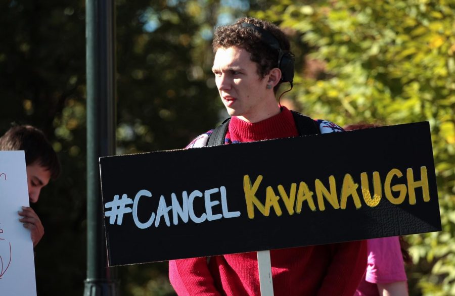 WSU sophomore Julian Dow joins Young Democrats, ACLU and other on-campus activist groups in protest of Brett Kavanaugh’s impending confirmation to the Supreme Court despite allegations of sexual assault Oct. 3 on the Glenn Terrell Friendship Mall.