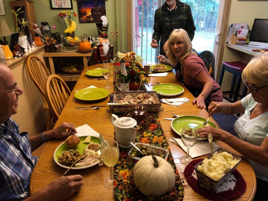 Editor-in-chief Dylan Greene sits down for Thanksgiving dinner with his family. His mother, Dawn, cooks all the food and makes sure everyones tummy is satisfied. 