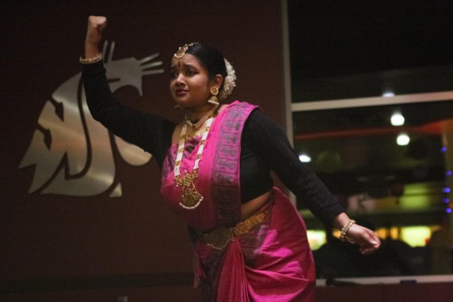 Washington State University alumna Smirtha Somaskantha Iyer performs a traditional Bharathanatyam dance at a celebration of Diwali hosted by the Indian Students Association on Wednesday night at Northside Cafe. I definitely enjoy dancing and showing the culture Iyer said of her experience performing.