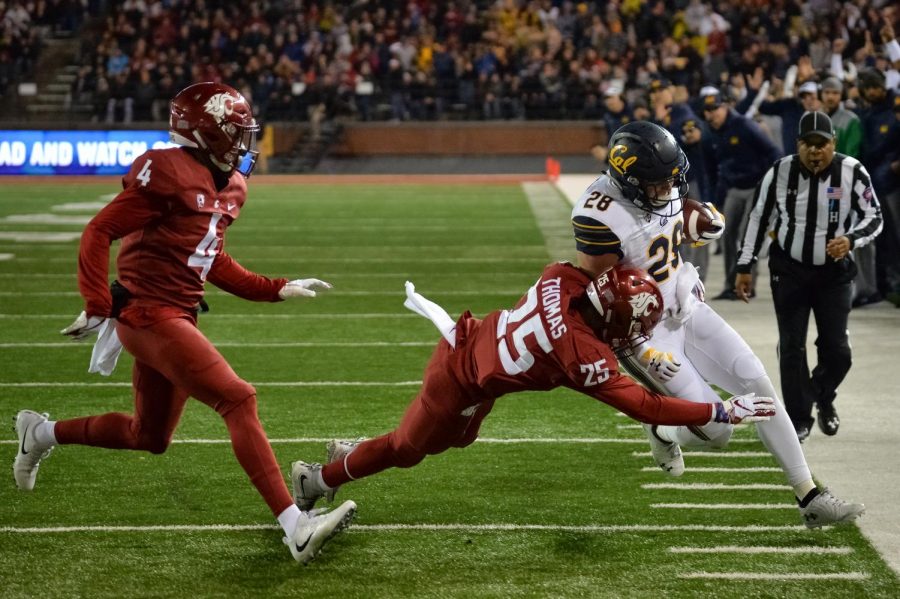 Redshirt+sophomore+saftey+Skyler+Thomas+tackles+California+redshirt+senior+running+back+Patrick+Laird+on+Saturday+in+Martin+Stadium.+Surpassing+LSU+in+the+ranks+would+improve+chances+of+WSU+making+the+playoffs.