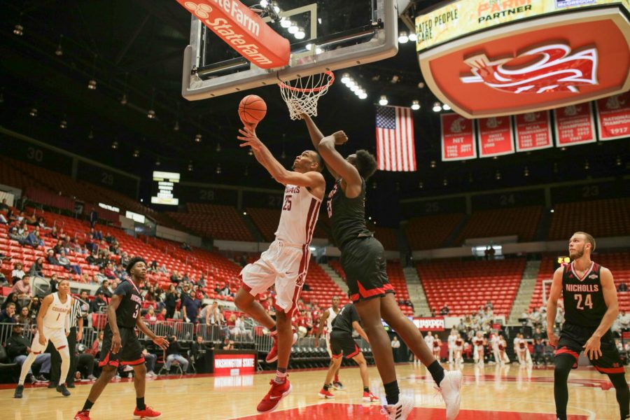 Redshirt sophomore forward Arinze Chidom drives to the hoop against Nicholls State on Sunday in Beasley Coliseum.
