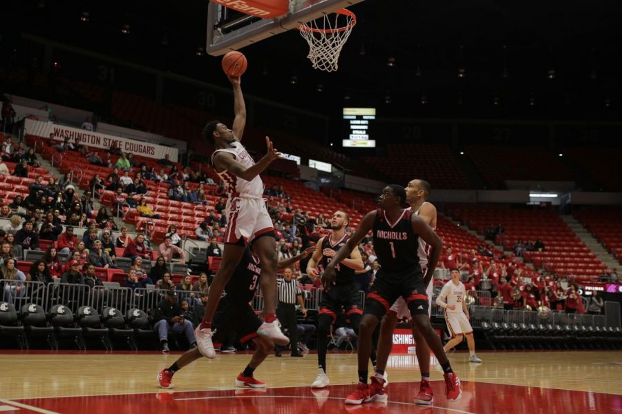 Senior forward Robert Franks Jr. goes up for a dunk in the game against Nicholls State on Sunday in Beasley Coliseum. Franks lscored 31 points and had 11 rebounds in the game.