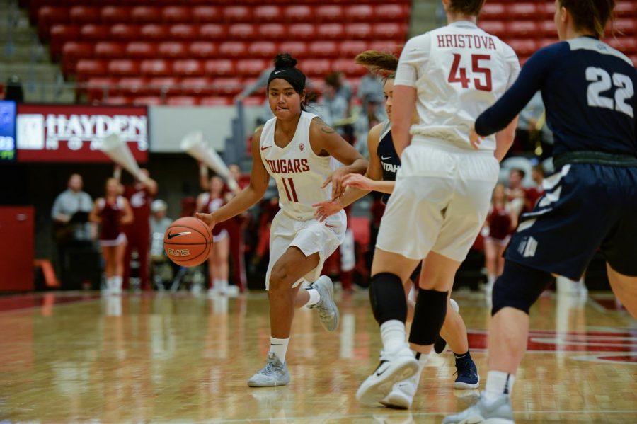 Junior guard Chanelle Molina drives the ball toward the basket in the game against Utah State on Nov. 6 at Beasley Coliseum. Molina has scored 19 points and dished out 12 assists in the first two games of season.